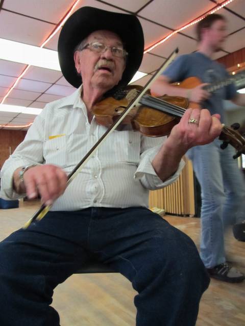 Junior leads the Western Swing Orchestra